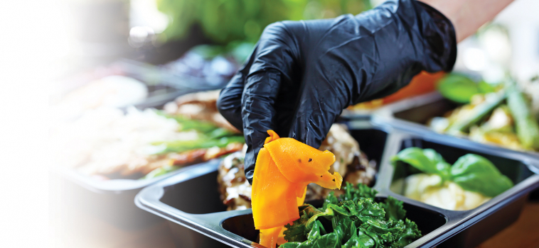 How and when should workers in food retail and processing wear gloves during a pandemic?